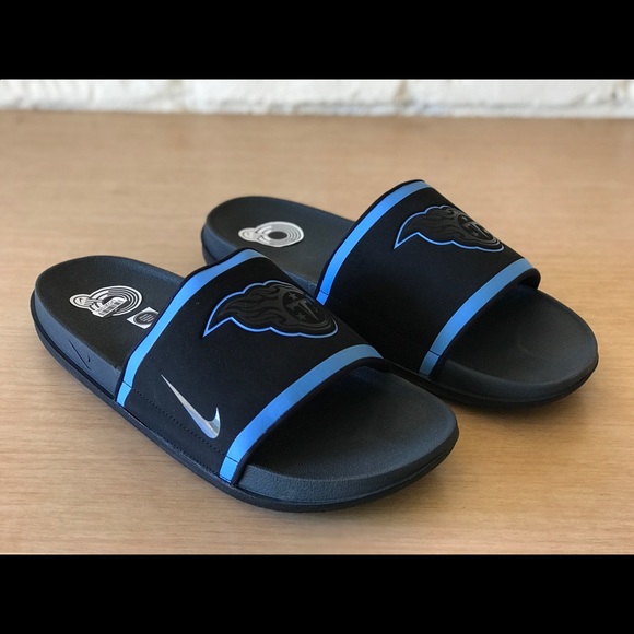 black and blue nike slides